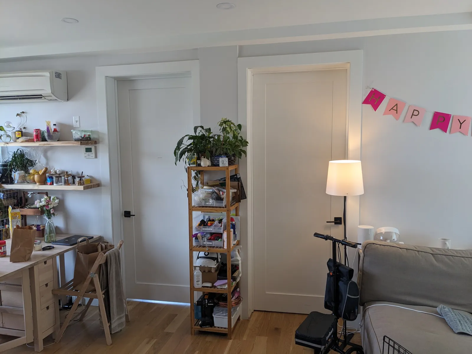 the tool shelf and two bedroom doors